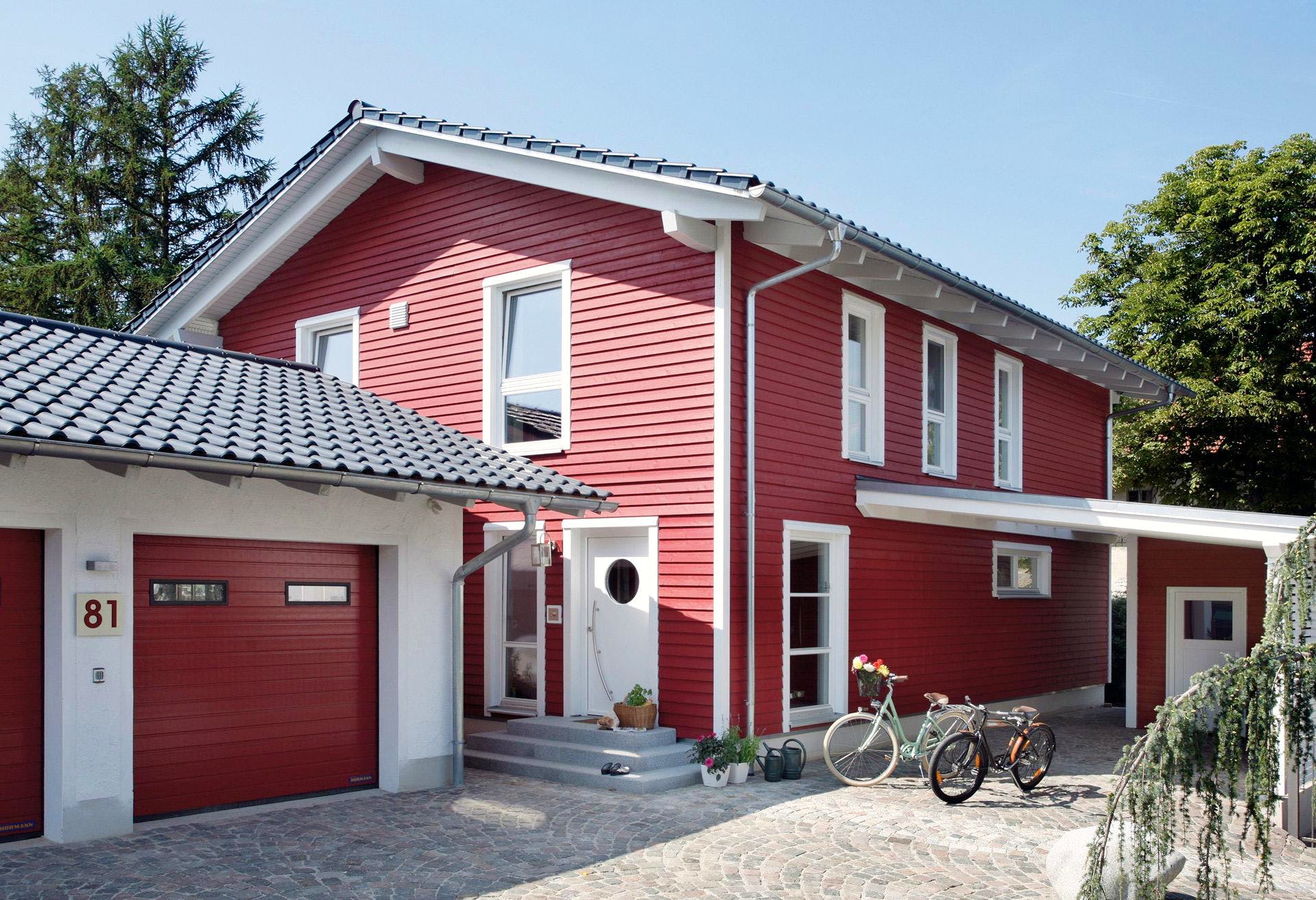Fertighaus E 15-153.2 - Fertighaus mit Doppelgarage von SchwörerHaus - Österreich Schlüsselfertig ab 443410€, Außenansicht 2