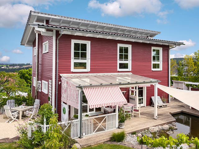 Fertighaus E 20-168.1 - Fertighaus im skandinavischen Landhausstil & Hampton-Flair von SchwörerHaus, Außenansicht 1 Fertighaus E 20-168.1 - Fertighaus im skandinavischen Landhausstil & Hampton-Flair von SchwörerHaus, Außenansicht 1