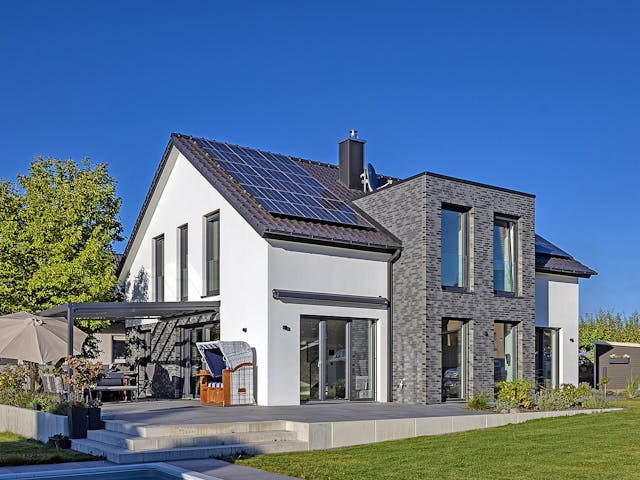 Massivhaus Haus Ginsterweg von Splietker Bau, Satteldach-Klassiker Außenansicht 1