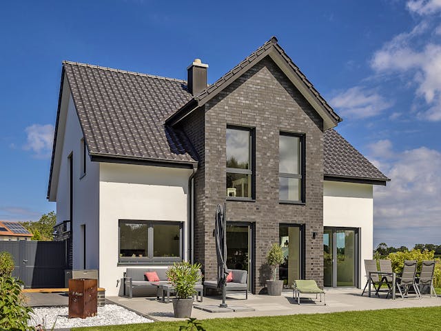 Massivhaus Haus Moorweg von Splietker Bau, Satteldach-Klassiker Außenansicht 1