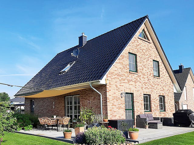 Massivhaus Familienhaus 160 von Team Massivhaus Schlüsselfertig ab 228900€, Satteldach-Klassiker Außenansicht 1
