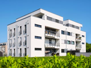 Fertighaus Mehrfamilienhaus mit 11 Wohnungen und einer Tiefgarage von WeberHaus - Mehrfamilienhäuser, Außenansicht 1