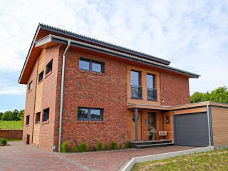 Fertighaus Pultdachhaus Modern von Zimmerer-Profibau Schlüsselfertig ab 550000€, Pultdachhaus Außenansicht 2